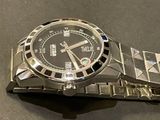 a watch that is sitting on top of a table