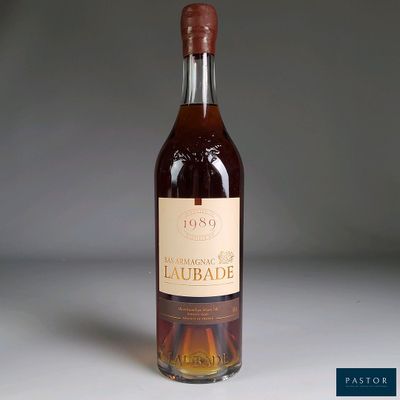 a bottle of wine that is sitting on a table