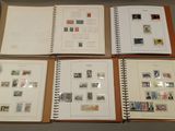 several different types of stamps are displayed in a binder