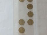 a lot of coins in a bag on the table