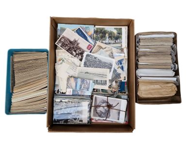 a box full of old postcards and a box full of old postcards