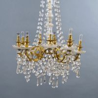 Lustre à 9 bras de lumières en métal doré à décor d'arabesqu… (photo 3)