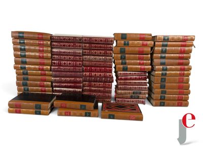 a lot of books stacked on top of each other