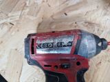 a drill that is sitting on a wooden table