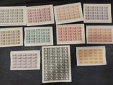 a bunch of stamps with different designs on them on a table