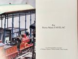 a book with a picture of a train on the cover