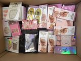 a box full of nail care products and a pair of scissors