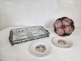 two plates and a tray on a table
