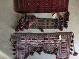 two pieces of rugs and a rug on a table