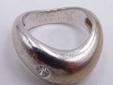 an image of a silver ring with a diamond on it