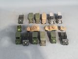 a lot of toy army vehicles and trucks on the table