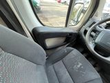 a view of the inside of a vehicle from the driver ' s seat
