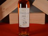 a bottle of wine that is sitting on a table