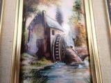 a picture of a painting of a water mill in a frame