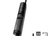 a close up of a cordless vacuum cleaner with a cleaning brush