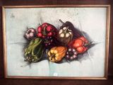 une photo d'un tableau représentant des légumes accroché au mur