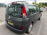 a small black van parked in a parking lot