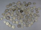 a lot of coins that are on a table