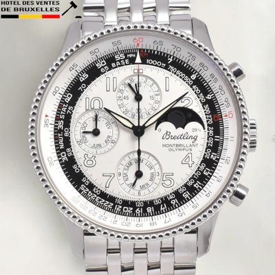 the watch has a black and white dial on the face of it