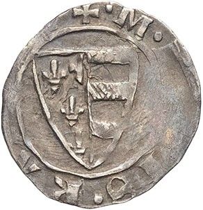 a close up of a silver coin with a shield on it