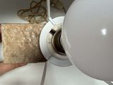 a person that is holding a roll of paper in their hand