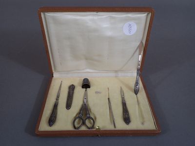 a box with a set of scissors and a pair of scissors