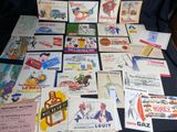 many different types of advertising cards on the table