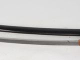 a knife that is laying on top of a table