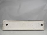 a close up of a metal plate with holes on it