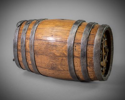 a close up of a wooden barrel on a gray background