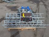 a large metal structure that is sitting in the middle of a parking lot