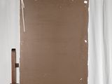 an easel with a piece of paper on top of it