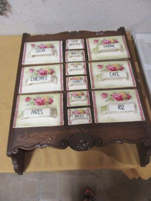 a wooden table with a lot of place cards on it