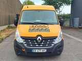 a yellow van parked in front of a building