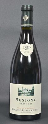 a bottle of wine that is sitting on a table