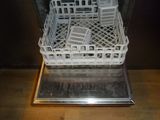 a dishwasher that has a lot of dishes inside of it