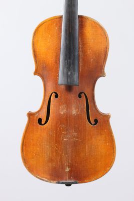 an old violin on a white background