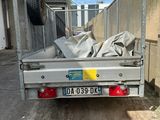 a truck that has a lot of stuff in the back of it