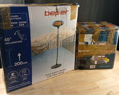 boxes of heaters sitting on a table next to each other on a table