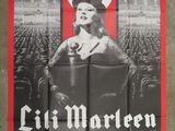 an old movie poster of a woman in a nazi hat