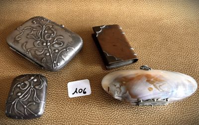 three different types of silver jewelry are displayed on a brown surface