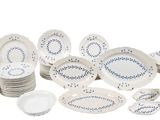 a picture of a collection of white and blue dishes