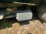 a close up of a truck ' s rear end with a speaker on it