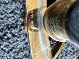 an image of a close up view of a brass plated telescope