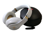 a pair of headphones sitting on top of a black case