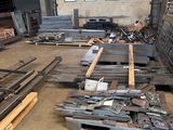 many pieces of metal in a warehouse with a lot of them