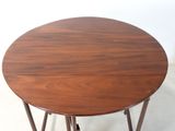 a small table with a wooden top and metal legs
