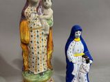 deux figurines représentant la Vierge Marie et l'Enfant Jésus