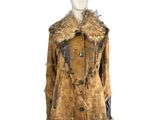 an image of a mannequin wearing a brown coat with a fur collar