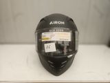 the helmet is black and has a sticker on it